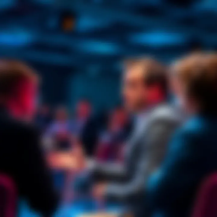 Alex Becker speaking about cryptocurrency trends and predictions at a panel, with people engaged in conversation around him.
