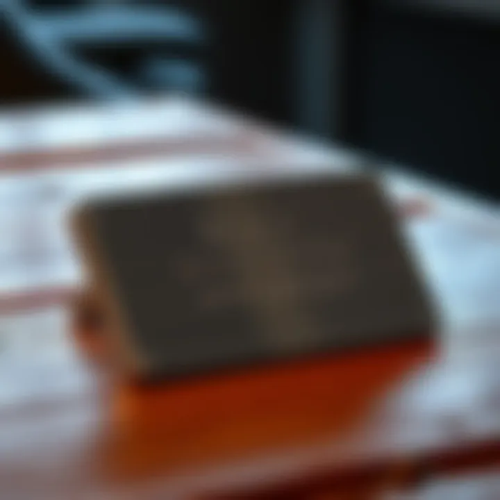 A steel plate with engraved seed phrase for cryptocurrency storage placed on a wooden table